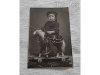 CHILD TOY HORSE 191.. yr. PHOTO