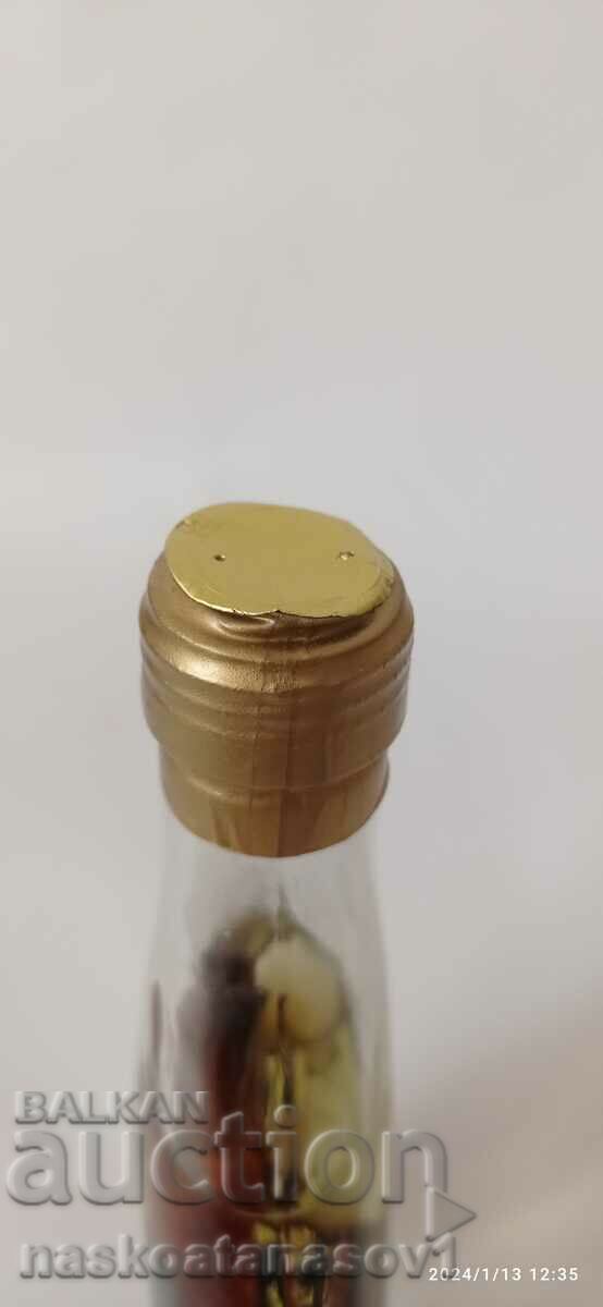 Auction Decoration in a glass bottle Auction Decoration in a glass bottle