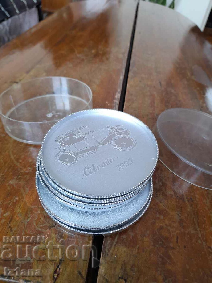 Стари алуминиеви подложки за чаши с Автомобили с цена 50.00 лв. | € 25.56 Стари алуминиеви подложки за чаши с Автомобили с цена 50.00 лв. | € 25.56