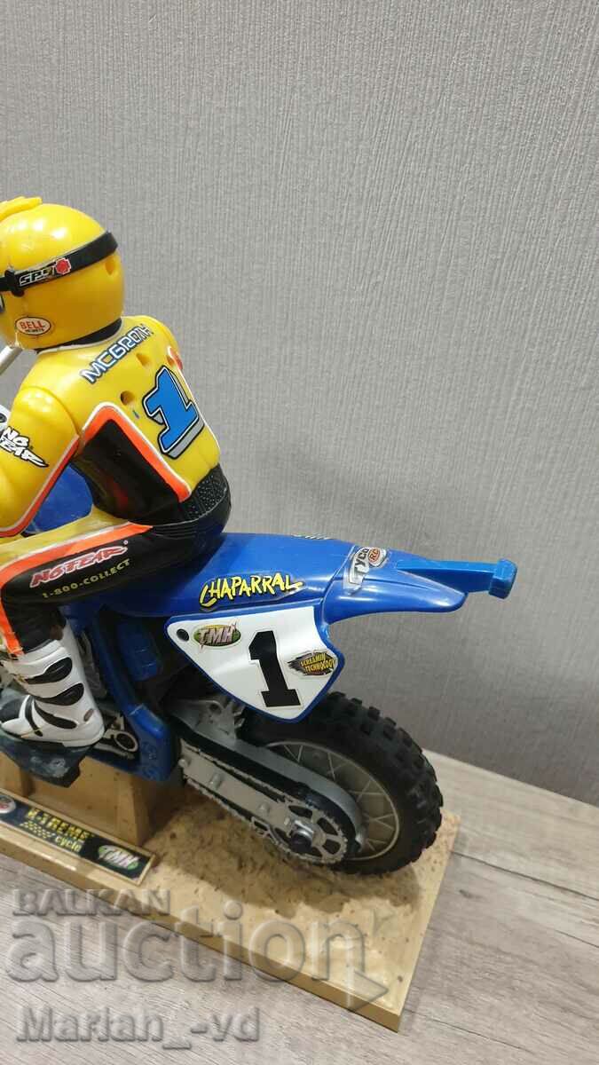 Delivery of Old electric toy biker