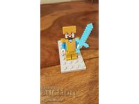 LEGO Minecraft - Steve - minifigurină Pearl Gold Legs
