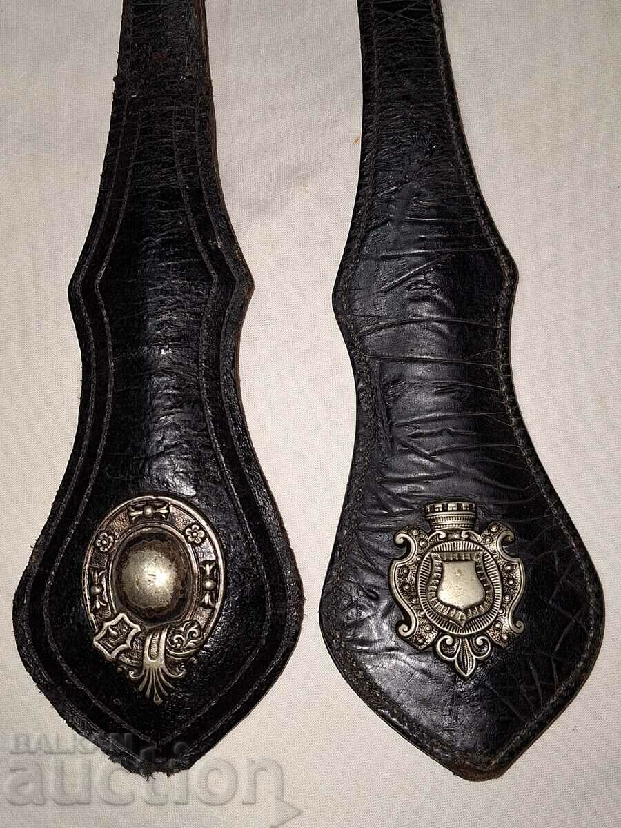 Pair of leather elements of horse harness with coat of arms symbol