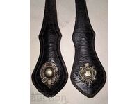 Pair of leather elements of horse harness with coat of arms symbol