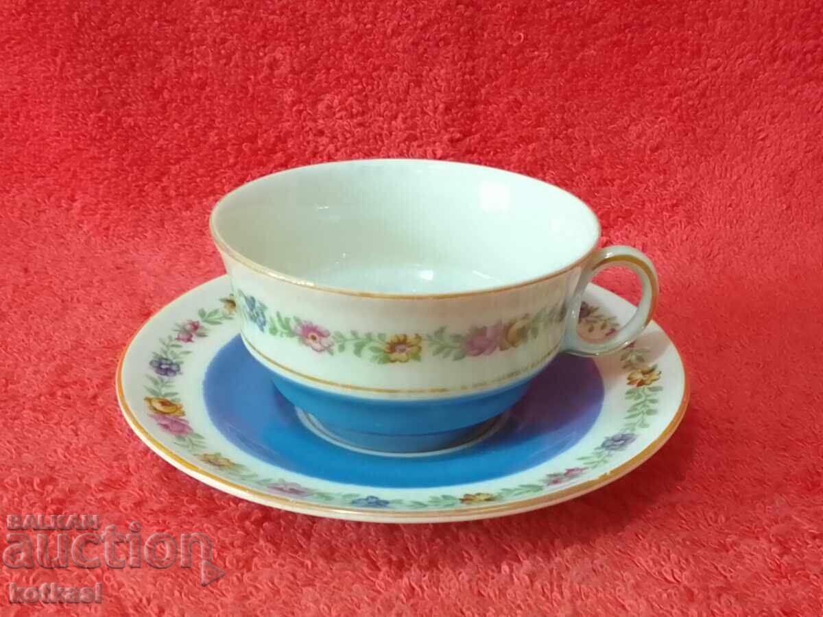 Old double set cup and saucer Old double set cup and saucer