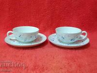 Two old double porcelain sets of cups and plates Arzberg Germany