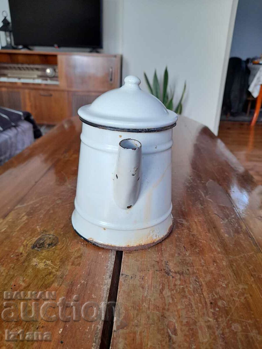 Old enamel teapot with price 30.00 BGN | € 15.34 Old enamel teapot with price 30.00 BGN | € 15.34