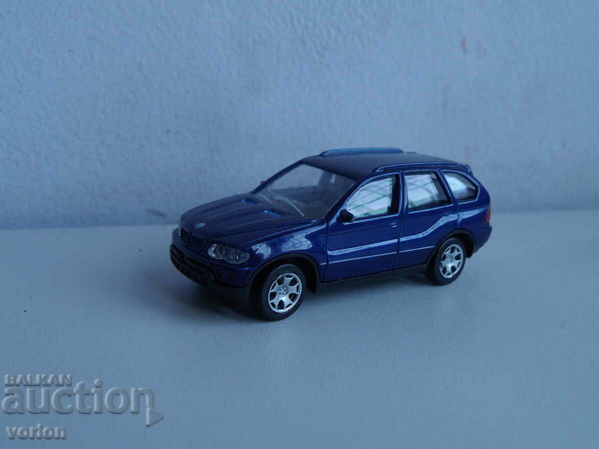 Coș: BMW X5 – Majorette China.