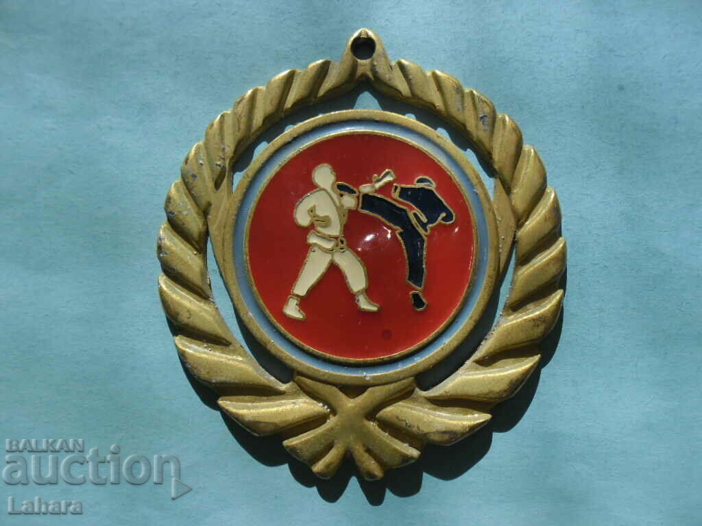Martial arts medal with price 6.00 BGN | € 3.07 Martial arts medal with price 6.00 BGN | € 3.07