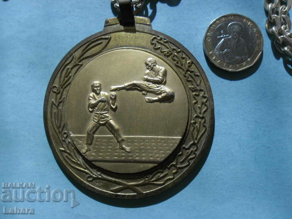 Martial arts medal with price 7.00 BGN | € 3.58 Martial arts medal with price 7.00 BGN | € 3.58