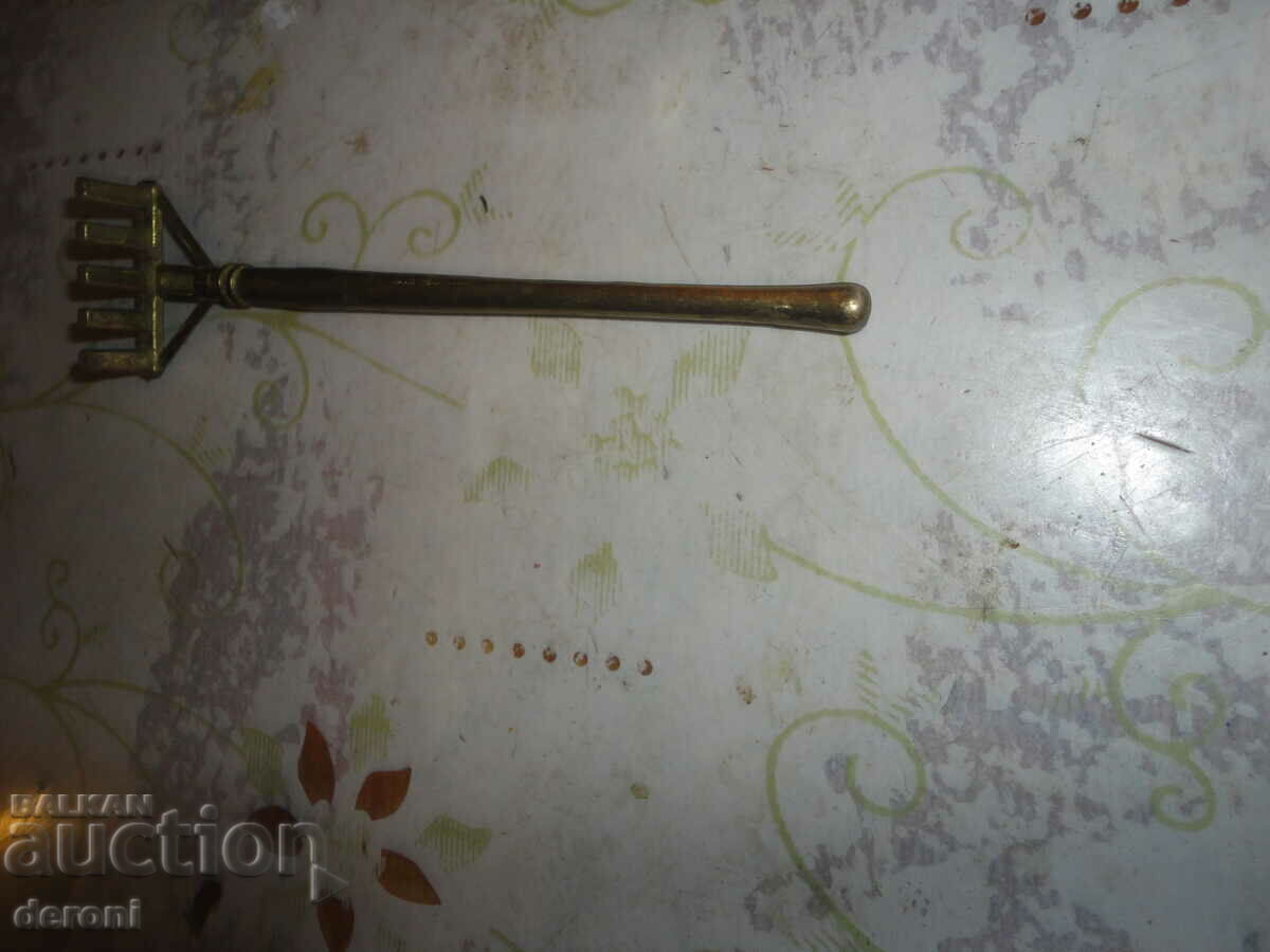 Auction  Bronze figure sculpting an oar