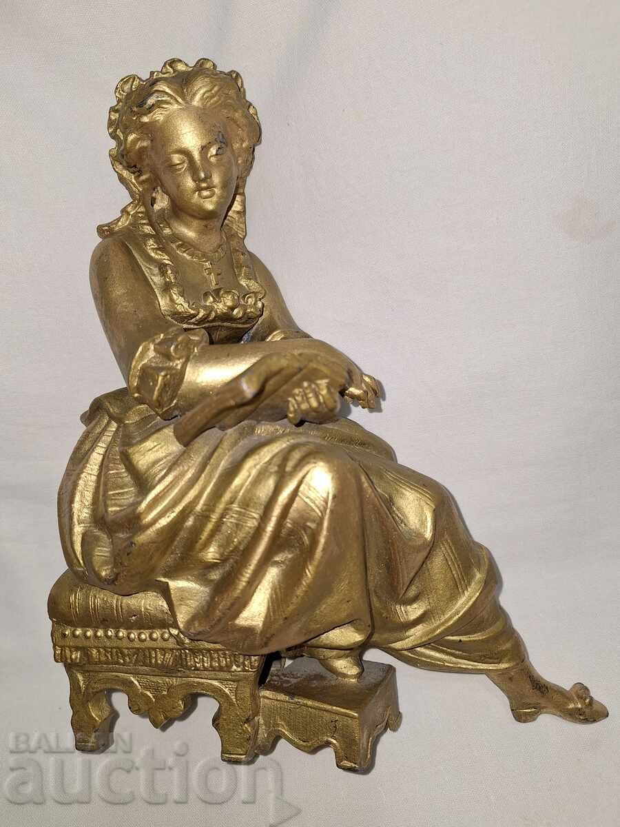 Statueta antică din plastic din metal