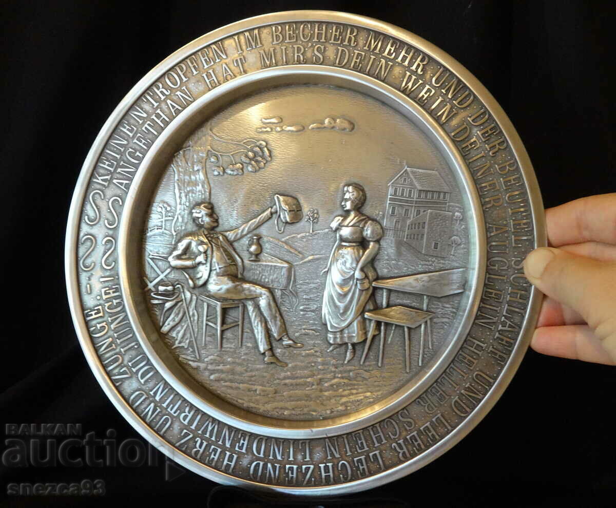 Pewter plate with relief picture Lindenwirtin.