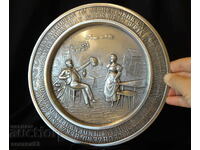 Pewter plate with relief picture Lindenwirtin.