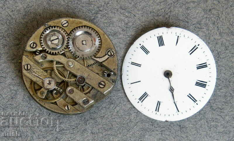 Old machine pocket watch with dial