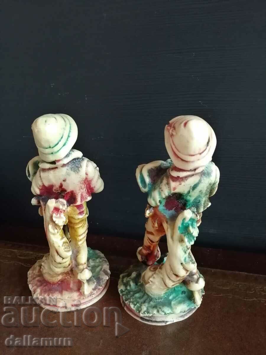 Delivery of a pair of vintage vinyl figurines