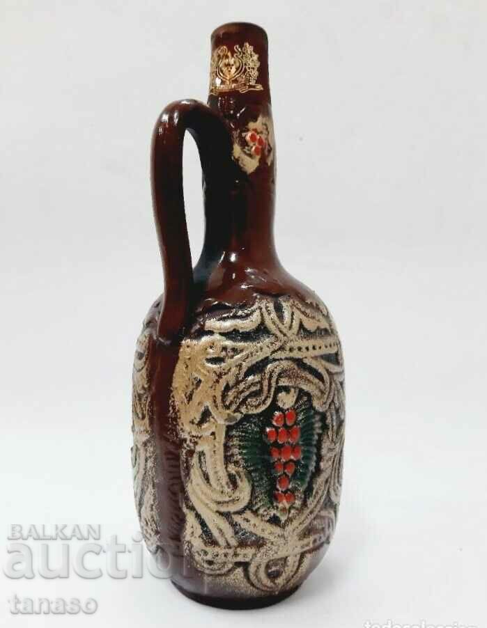 Richly decorated ceramic pitcher, bottle (4.5)