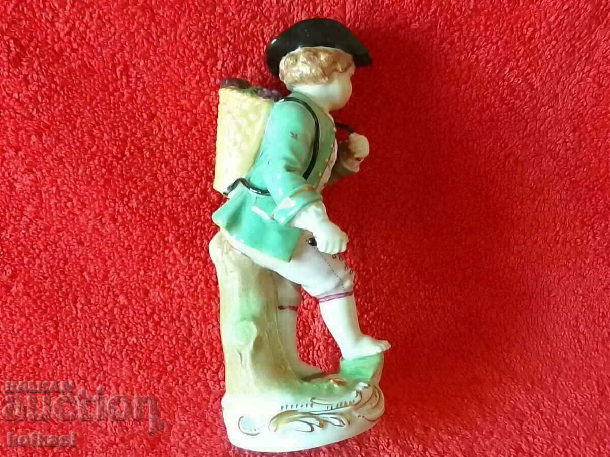 Delivery of Old porcelain figurine Boy Grape Picker Dresden Germany Delivery of Old porcelain figurine Boy Grape Picker Dresden Germany