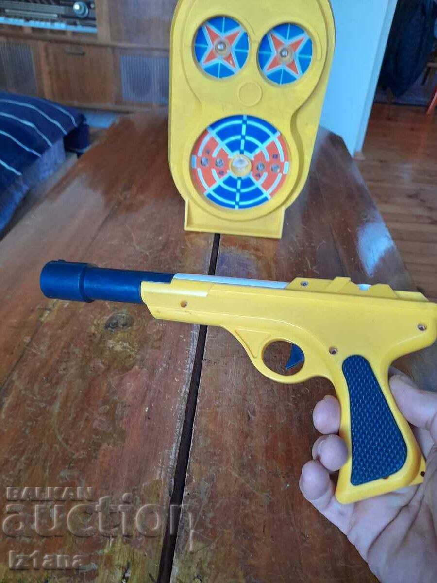 Auction  Old electronic children's gun with Norma target