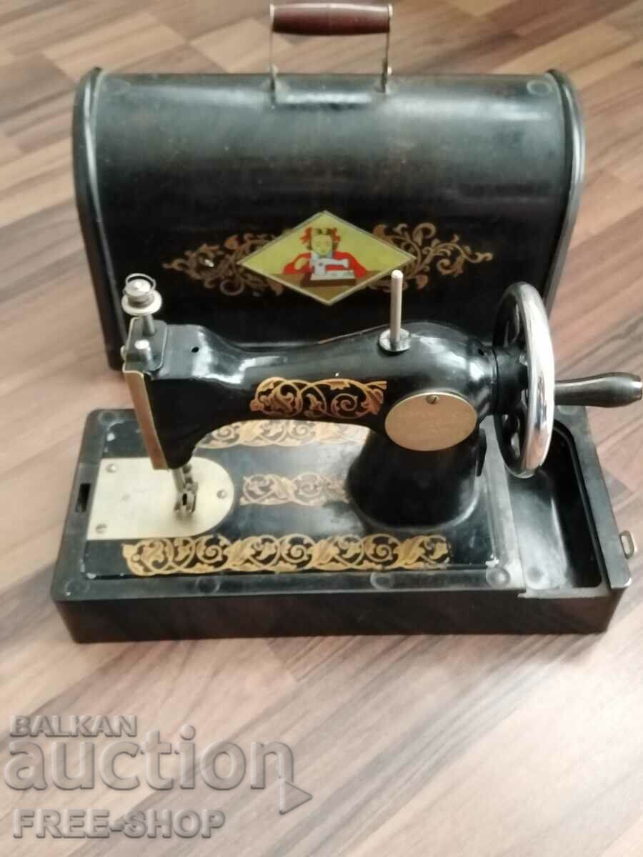 OLD TOY SEWING MACHINE