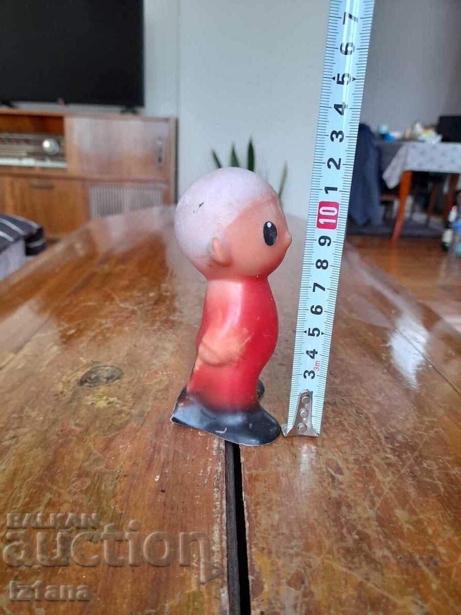 Delivery of Old rubber toy Boy
