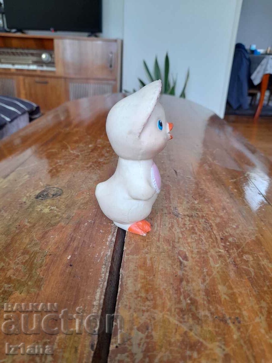 Delivery of Old rubber toy chicken