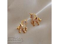 18k medical steel earrings. gold plated Unicorn