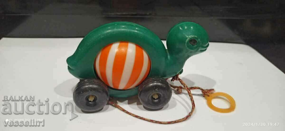 Veche jucărie socială melc de trage Veche jucărie socială melc de trage