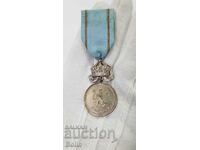 Very rare silver Regency Medal of Merit with crown