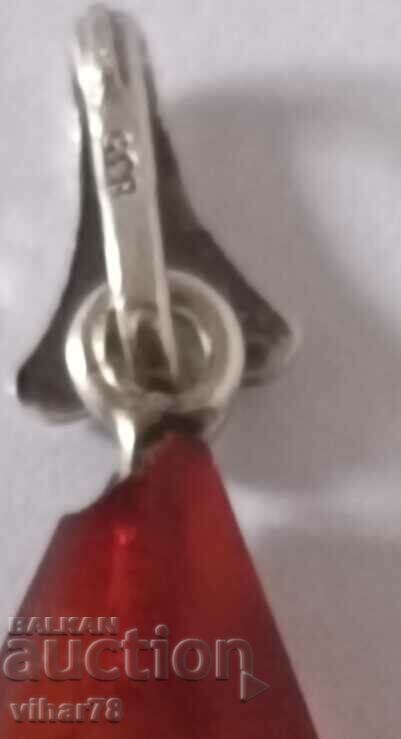 Auction  Silver pendant with amber