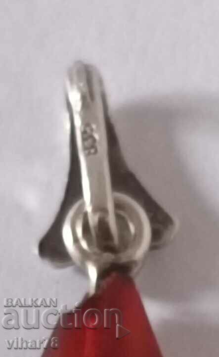 Delivery of Silver pendant with amber