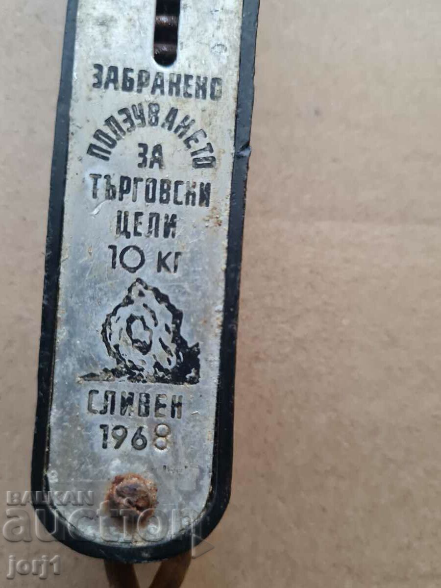 Delivery of an old scale with a hook