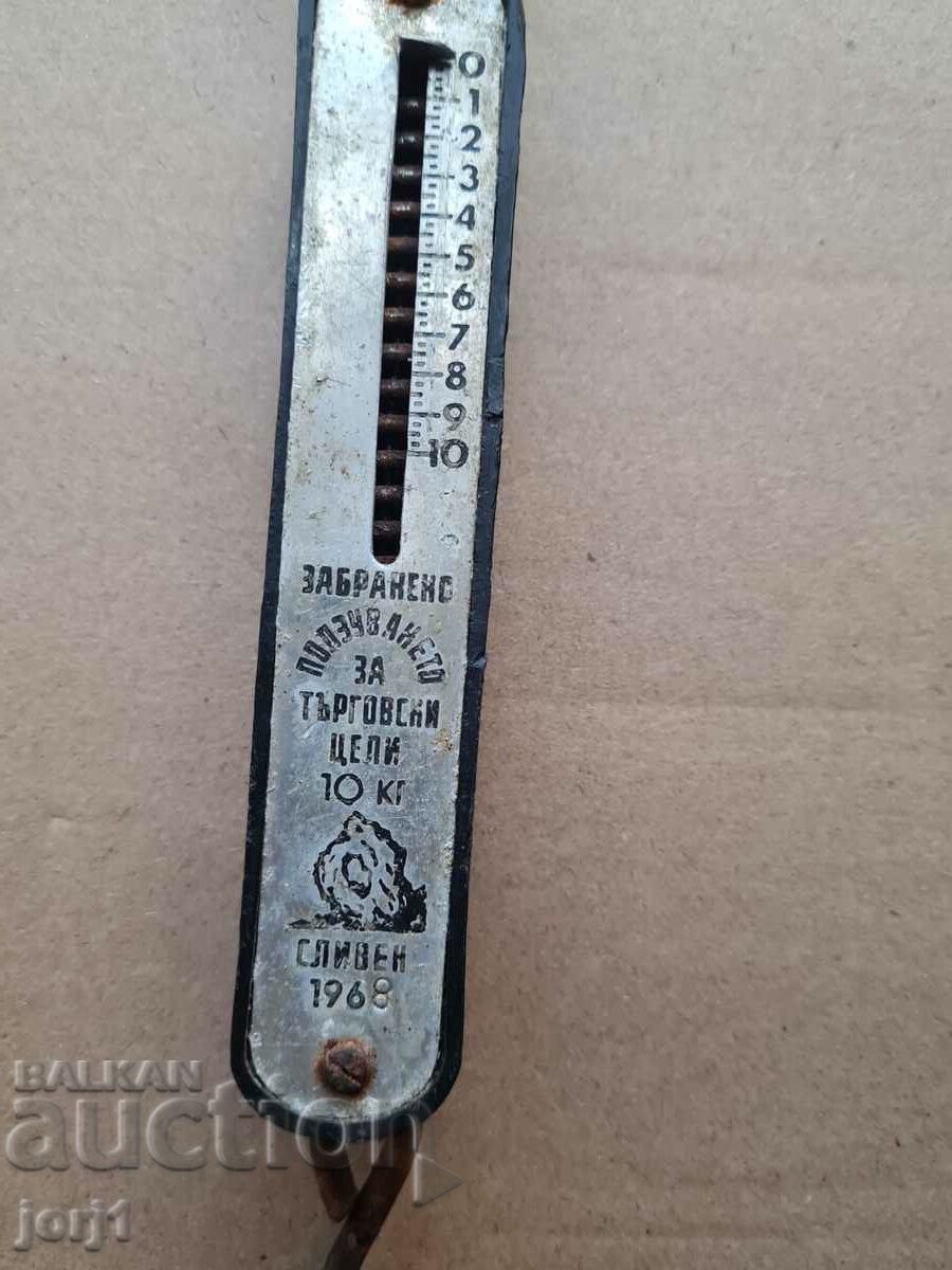 an old scale with a hook - 5