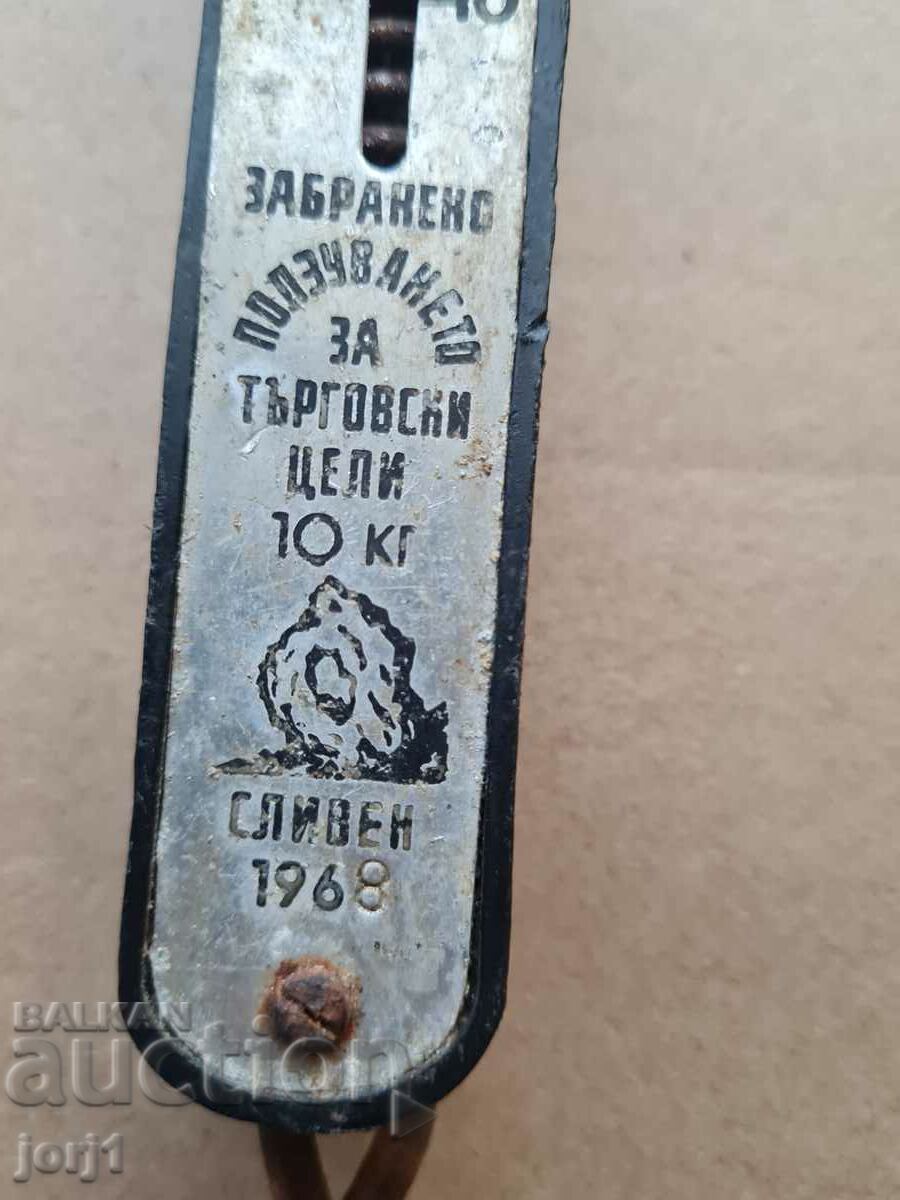 an old scale with a hook - 7