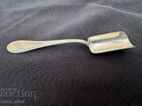 Silver sugar bowl spoon