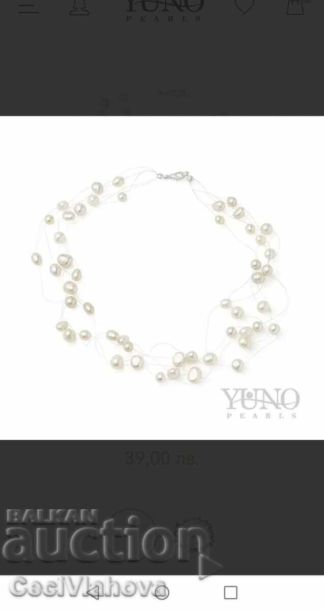 Necklace with real pearls on a string
