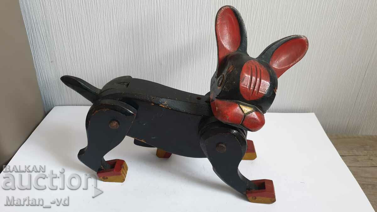 Delivery of Old wooden toy dog Delivery of Old wooden toy dog