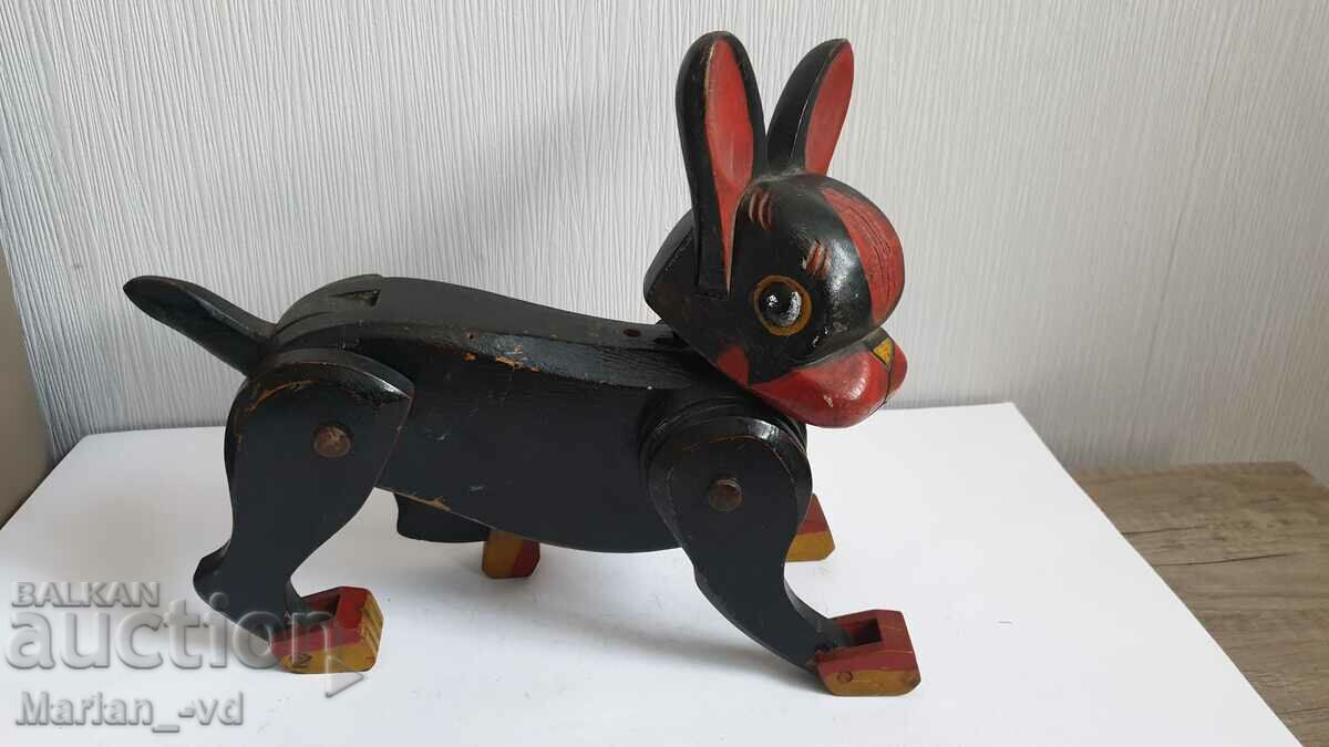 Old wooden toy dog