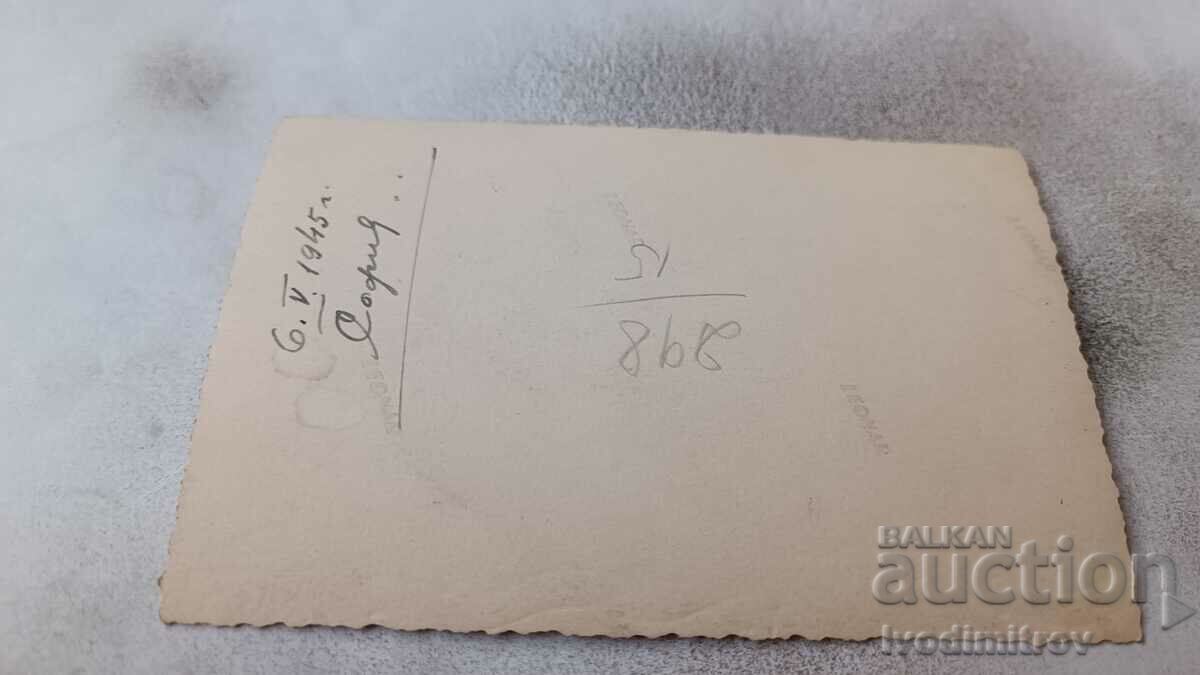 Photo Sofia Man, woman and girl on a walk 1945 with price 2.45 BGN | € 1.25 Photo Sofia Man, woman and girl on a walk 1945 with price 2.45 BGN | € 1.25