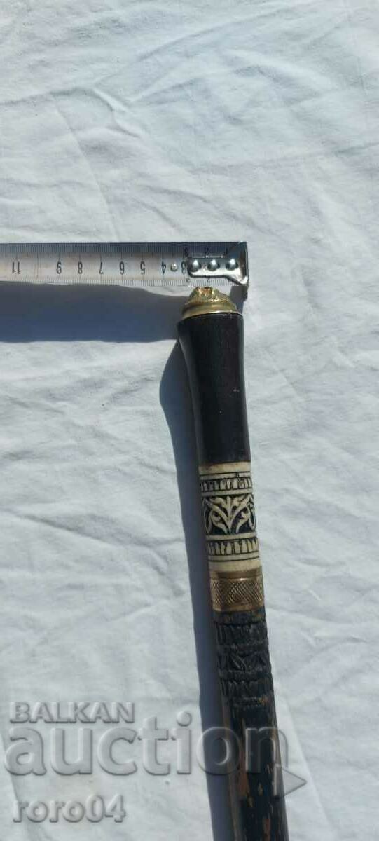 UN BASTON - 7