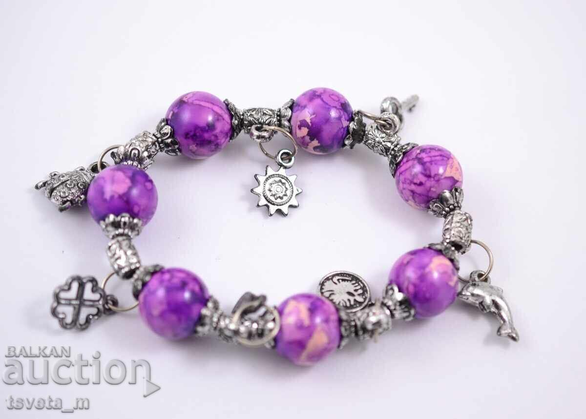 Elastic bracelet with charms with price 4.00 BGN | € 2.05