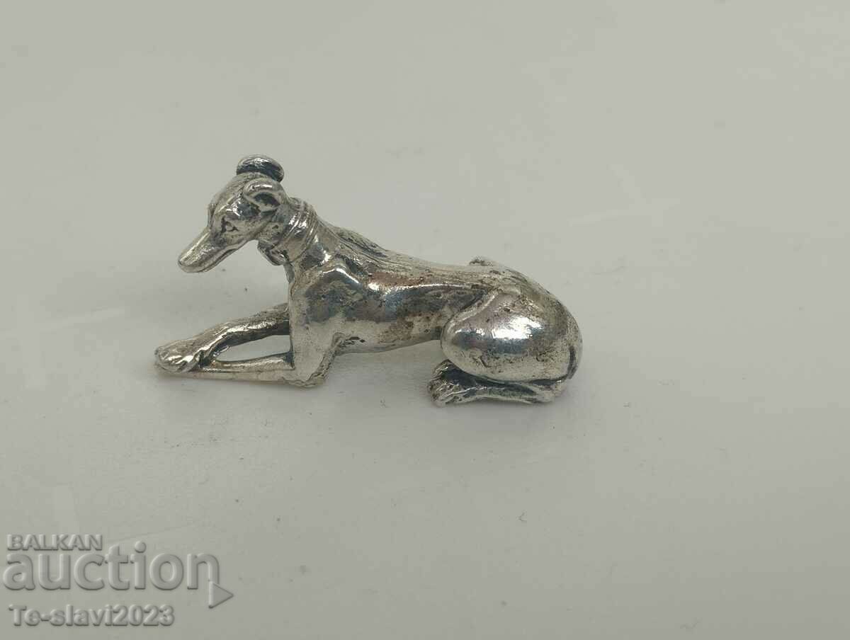 Old silver dog figure