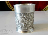 Brandy glass, pewter shot, medieval march.