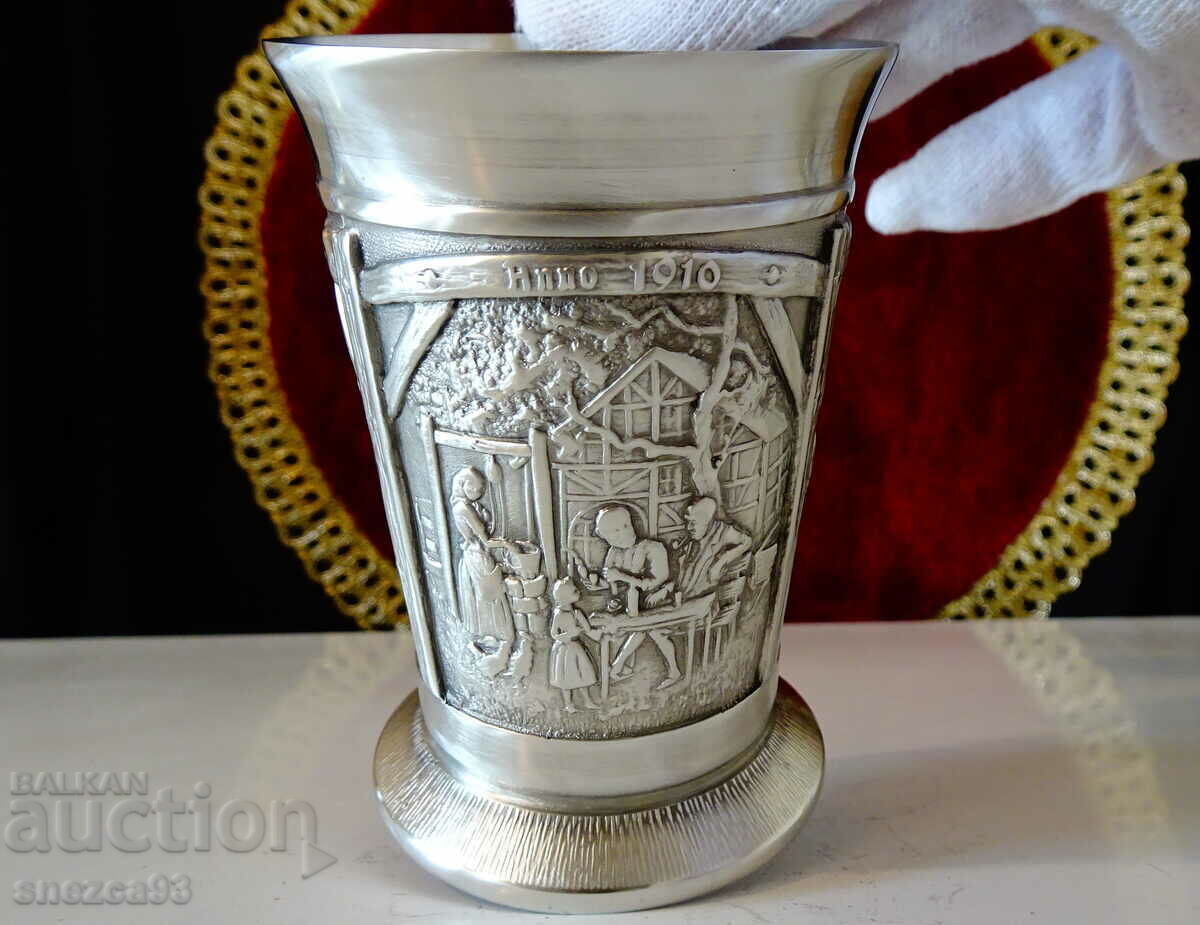 Delivery of Two pewter wine goblets, three romantic paintings