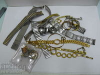 Lot of different watch chains and other parts