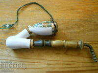 antique porcelain pipe with amber mouthpiece