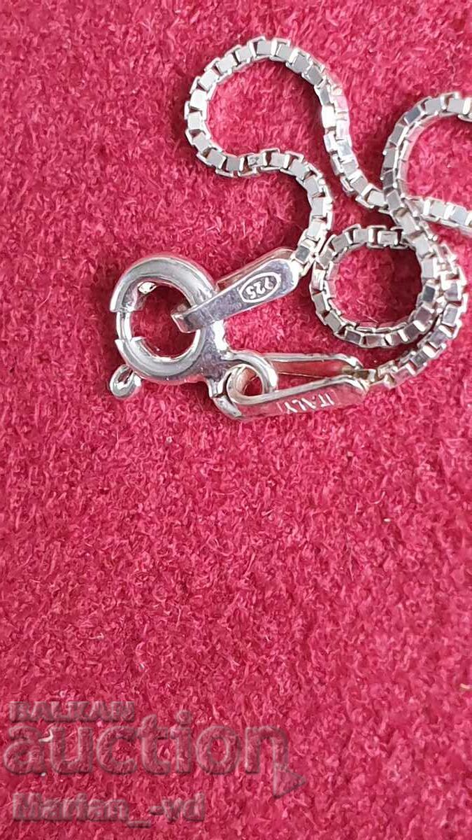 Auction Amber pendant with silver fittings and silver chain Auction Amber pendant with silver fittings and silver chain