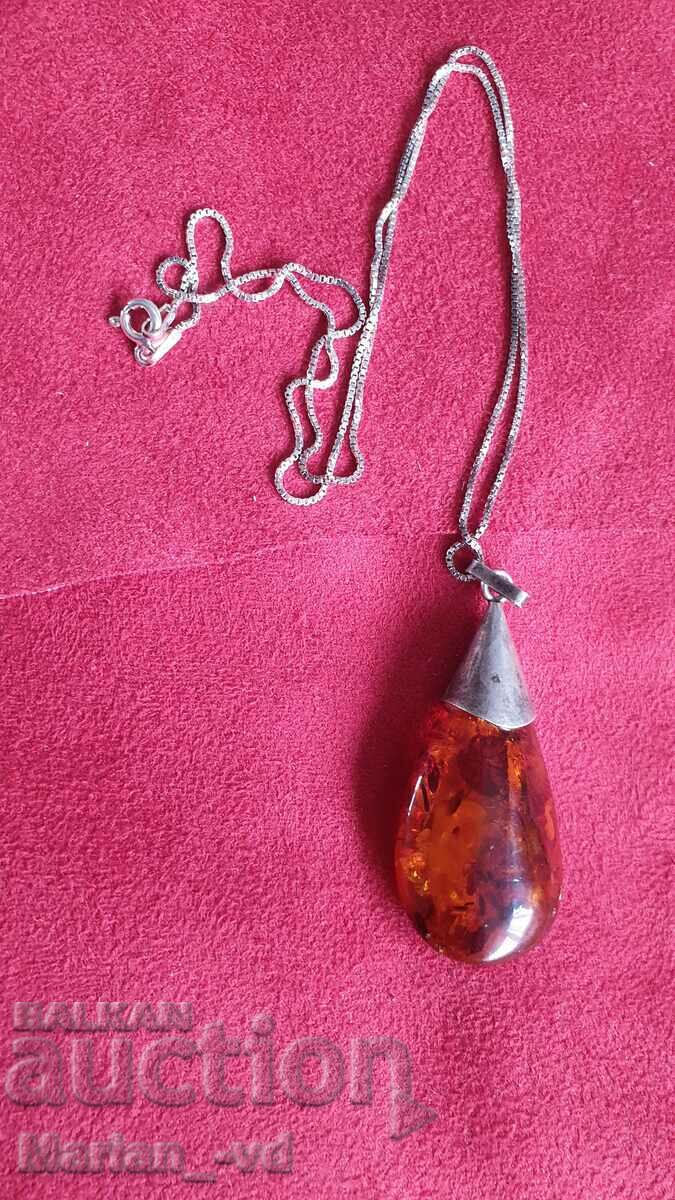 Amber pendant with silver fittings and silver chain