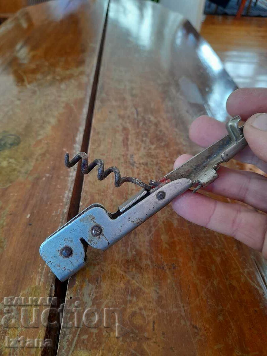 Auction  Old can opener, sharpener