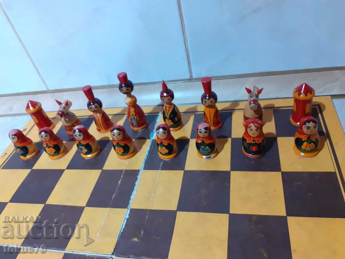 Russian wooden chess with handmade matryoshka pieces with price 90.00 BGN | € 46.02 Russian wooden chess with handmade matryoshka pieces with price 90.00 BGN | € 46.02
