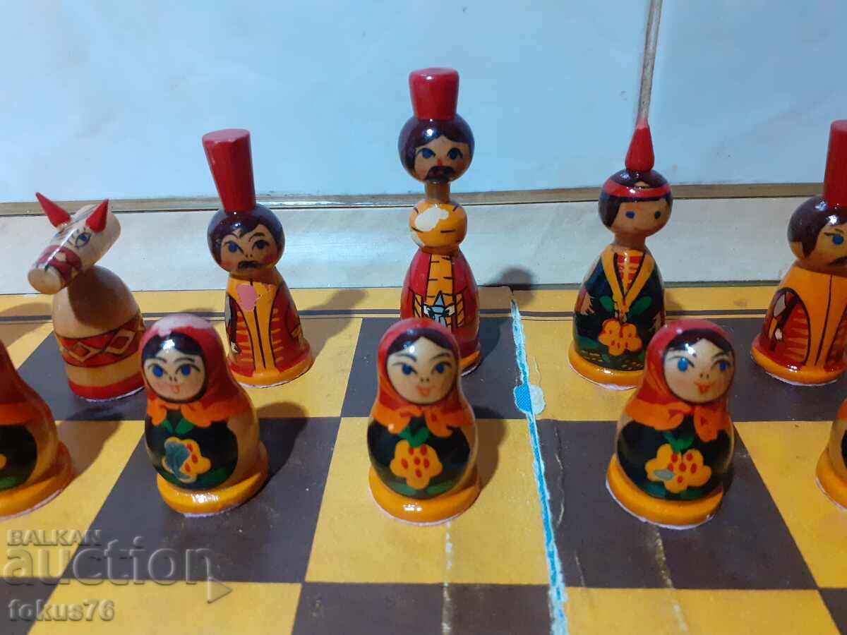 Auction Russian wooden chess with handmade matryoshka pieces Auction Russian wooden chess with handmade matryoshka pieces